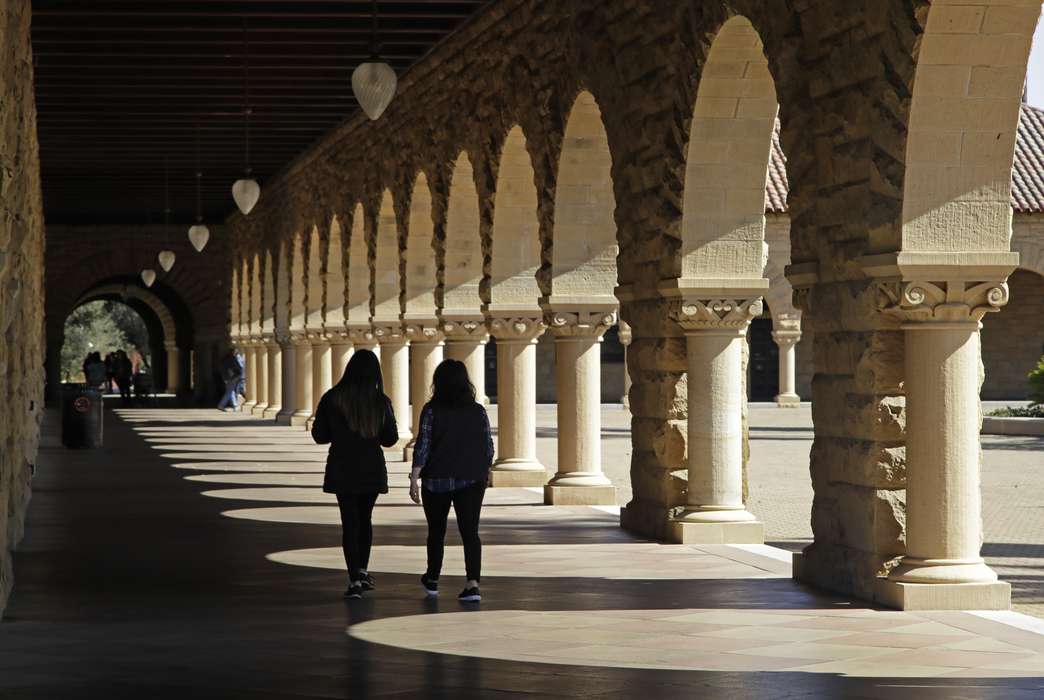 Simulations show reopening universities isn't without risk. (AP Photo/Ben Margot)