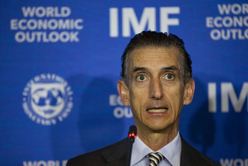 U.S. banks' influence over the IMF leads to high profits. (AP Photo/Esteban Felix)