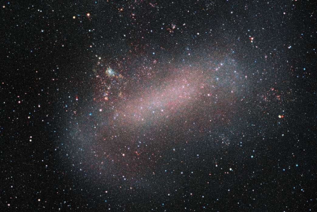 A 2019 image of the Large Magellanic Cloud, the Milky Way Galaxy's largest satellite galaxy, by the European Southern Observatory's VISTA telescope. (ESO/VMC Survey)