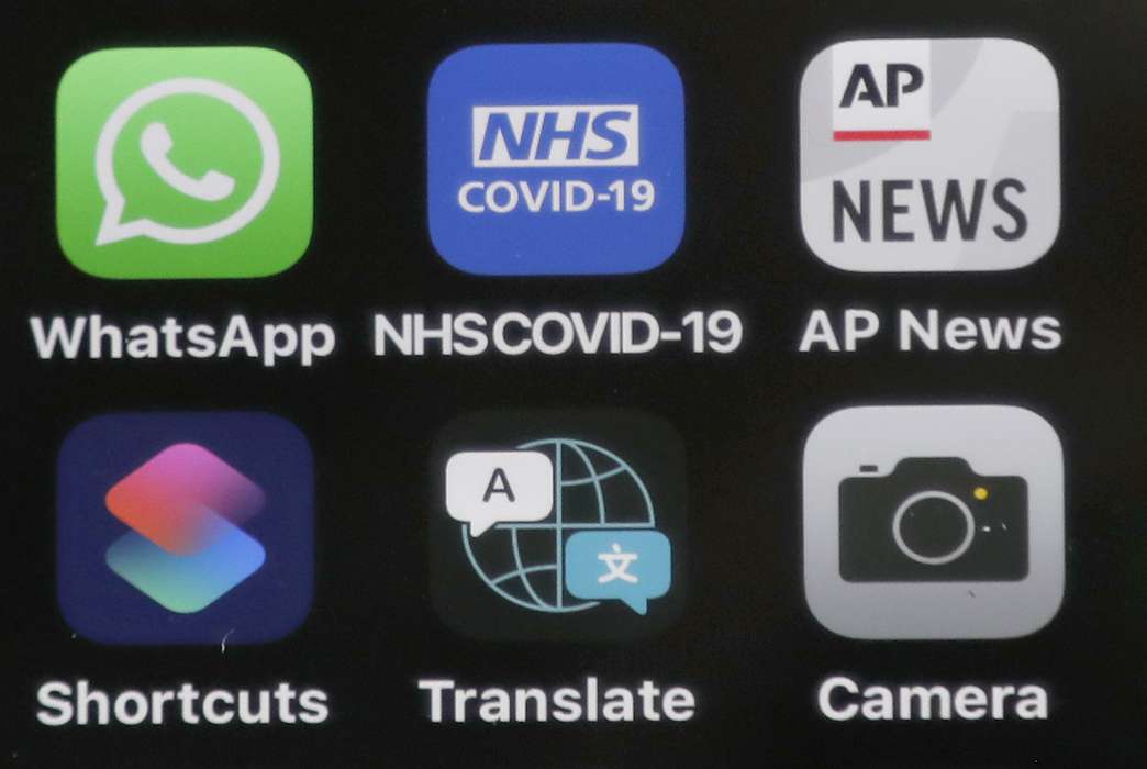 Brits don't mind contact tracing, as long as they know it's happening. (AP Photo/Frank Augstein)