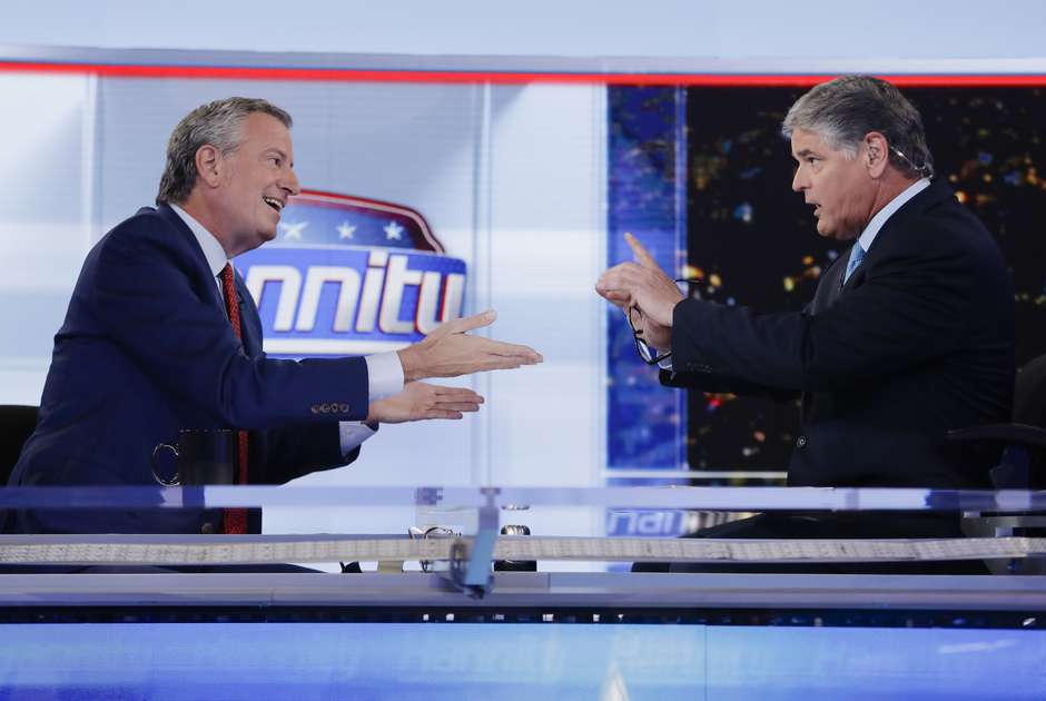 Watching both sides can soften political attitudes. (AP Photo/Frank Franklin II)