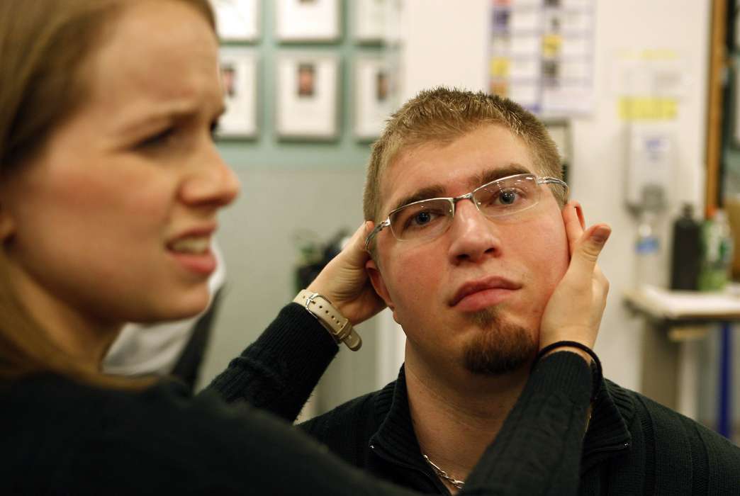 A new drug cocktail shows promise for headache pain. (AP Photo/Mel Evans)