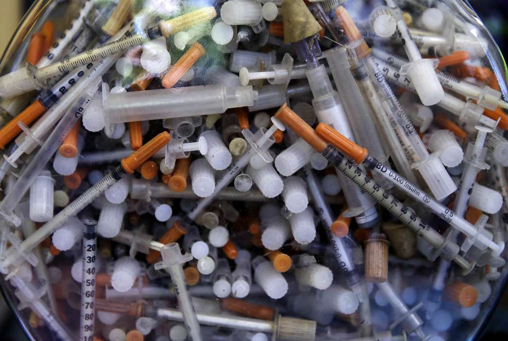 European experts say the U.S. is going about heroin management wrong. (AP Photo/Charles Krupa)