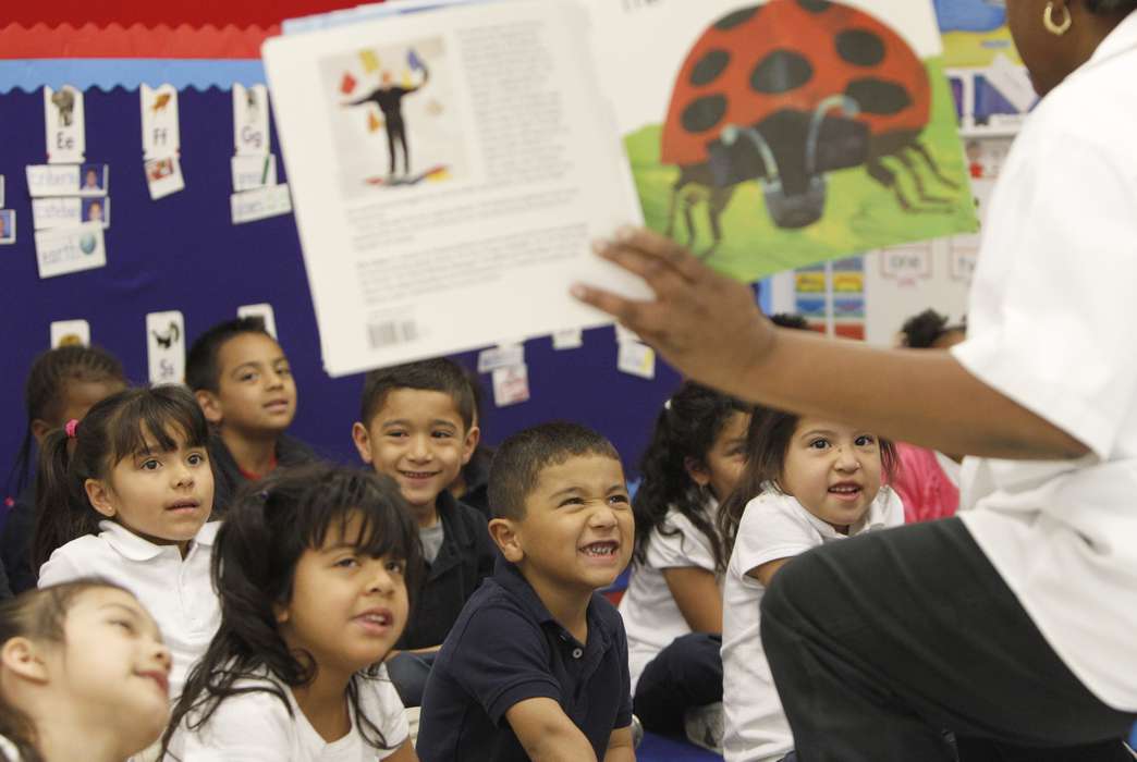 Kids like teachers who "speak their language" ... literally. (AP Photo/LM Otero)