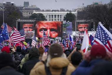 Research indicates that rising support for authoritarian ideology and political candidates could be partially explained by more complex economic-induced value changes, rather than pure economic self-interest or non-economic values. Above, Trump supporters participate in a rally in Washington, D.C. (AP Photo/John Minchillo)