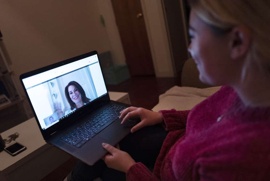 Video visits with a mental health professional might be just as effective as in-person couch time. (AP Photo/Mark Lennihan)