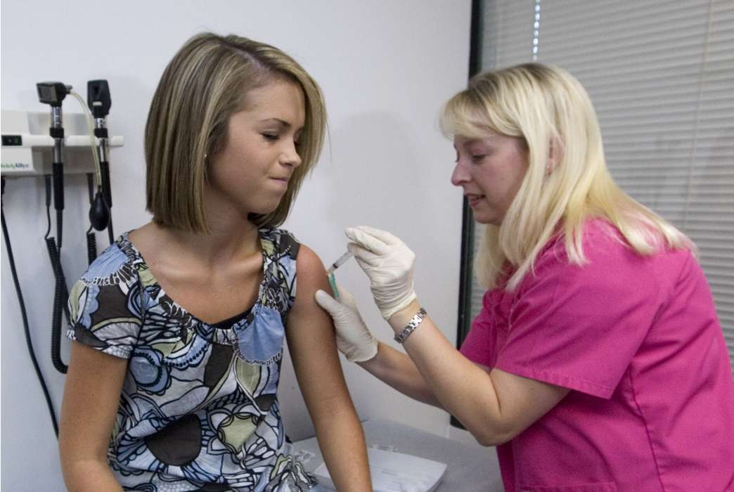For those over 26, getting the HPV vaccine might not make financial sense. (AP Photo/John Amis)
